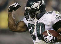 Brian Dawkins flexing